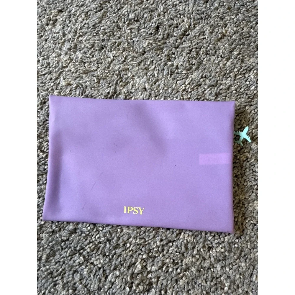 IPSY - Wanderlust - Purple Glam Bag - Airplane Zipper Charm‎
